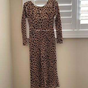 This is the Target art class brand, jumper in cheetah print. Size 7/8.